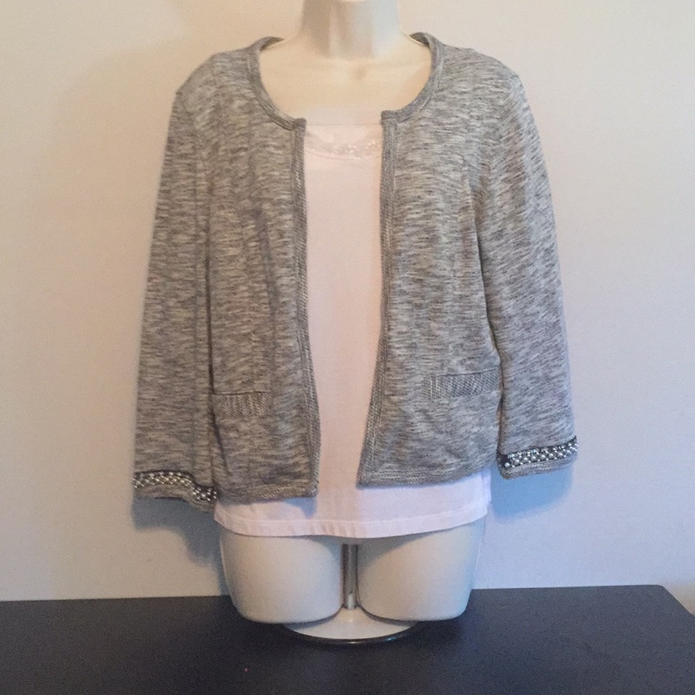 Cardigan only has decoration on sleeves w/ pockets